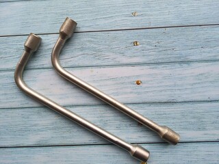 Wrench , isolated on wooden table.
