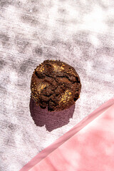 Delicious Muffin on grey stone background.