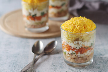 Mimosa salad in transparent glass