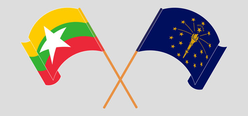 Crossed and waving flags of the State of Indiana and Myanmar