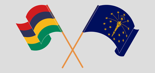 Crossed and waving flags of Mauritius and the State of Indiana