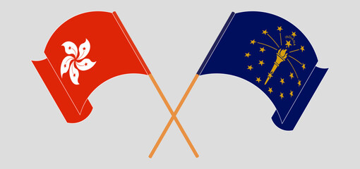 Crossed and waving flags of Hong Kong and the State of Indiana