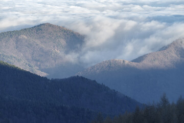 Fog revealing Ligurian Alps mountain range,  Province of Imperia, Italy