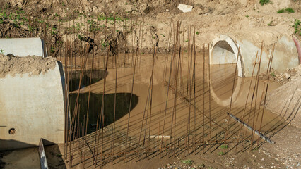 Construction of the river drains. Construction drains to prevent flooding in the city. Drain water into the river.