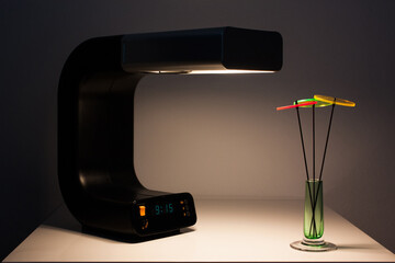 modern desk lamp with built in digital clock spaceage vintage midcentury design front side view...