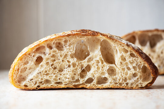 Slice of homemade sourdough bread. Close up.