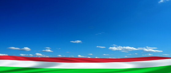Hungary flag on blue sky background