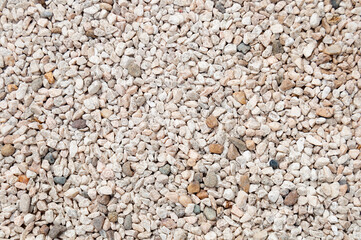 White, gray and brown pebbles image as a background