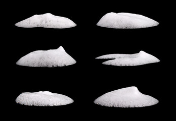 white foam from soap isolated on a black background - obrazy, fototapety, plakaty