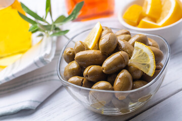 Cracked green olives. Cracked green olives with lemon. Turkish style olive (Turkish name; kirma zeytin)