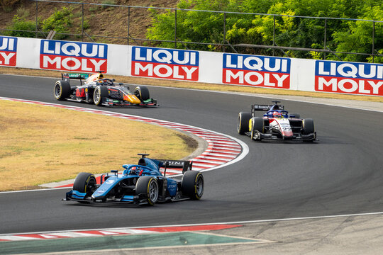 2022 Formula 2 Car at the Hungarian Sprint Race - Virtuosi Racing, Charouz Racing System and PREMA Racing - Jack Doohan leads, Enzo Fittipaldi and Dennis Hauger - Cornering