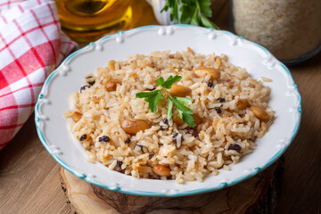 Traditional delicious Turkish food; Almond rice pilaf (Turkish name; Bademli pirinc pilavi)