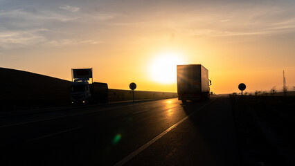 Vehicles exporting at sunrise view