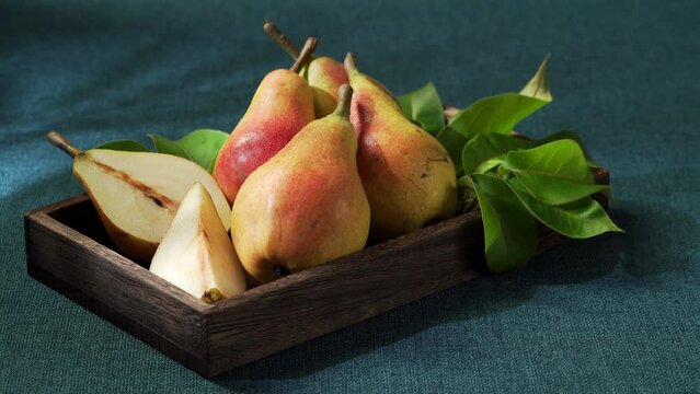 Fresh eggplant pears on blue background