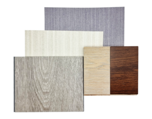 interior material samples including ash vinyl flooring, oak ash and italian walnut engineered flooring, beige and grey fabric interior wallpaper isolated on background with clipping path.