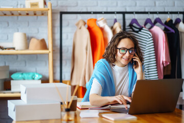 Small business owner, entrepreneur, seller with laptop analyze sales, new orders to be sent and...