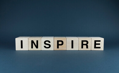 Inspire. Cubes form the word Inspire.