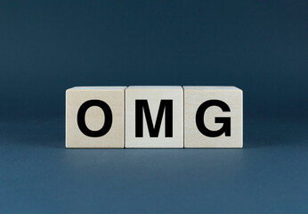 Omg. Cubes form the word OMG. Concept of the word OMG - Oh My God - obrazy, fototapety, plakaty