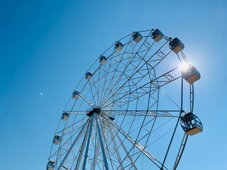 ferris wheel on a blue sky