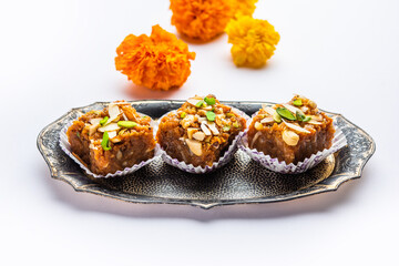 Dodha Barfi or Doda Burfi is a traditional Indian sweet, which has a grainy and chewy texture