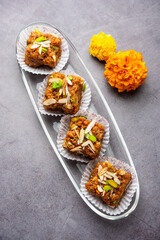 Dodha Barfi or Doda Burfi is a traditional Indian sweet, which has a grainy and chewy texture