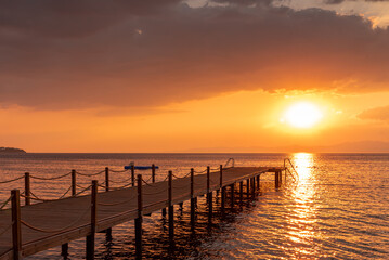 Fototapeta na wymiar sunset pier in the sea 
