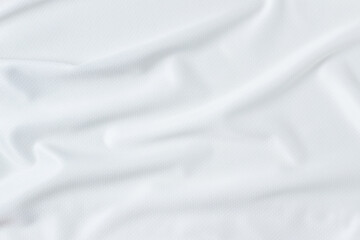 Obraz premium abstract smooth elegant white fabric texture background, flowing satin waves