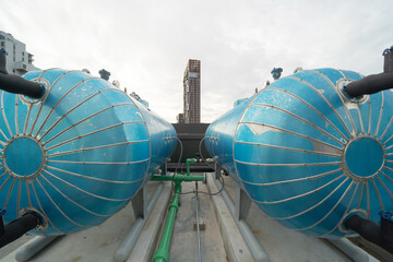 Chiller tower or cooling tower on rooftop of a office building in urban city. System work....