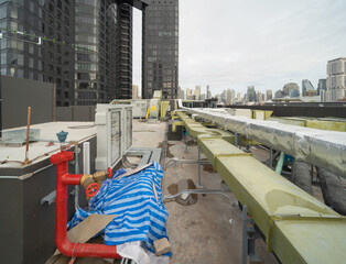 Chiller tower or cooling tower on rooftop of a office building in urban city. System work....