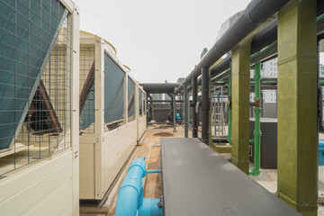 Chiller tower or cooling tower on rooftop of a office building in urban city. System work....