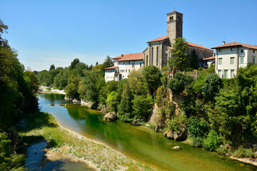 Fototapeta na wymiar The Natisone river during the 2022 drought as it flows through the north east Italian town of Cividale del Friuli, Udine Province, Friuli-Venezia Giulia. August 14th 2022 