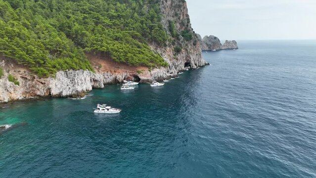 A large yacht stands at sea aerial view 4 K Turkey Alanya 