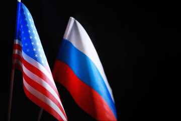 The concept of diplomatic relations. Flag of the Russian Federation and partner. Sanctions pressure...