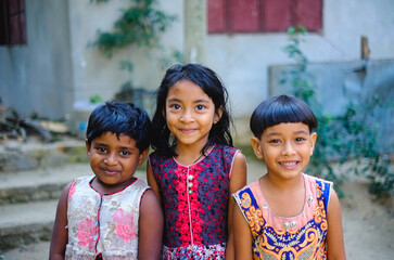 south asian little sister's lovely moment , Bangladeshi village girl standing together