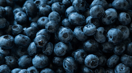 Blueberries on a market. Background of scattered blueberries.