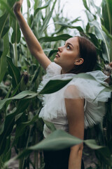 Outdoor woman portrait in green field. Fashion young caucasian beauty girl 