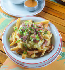 French fries with bacon and cheddar