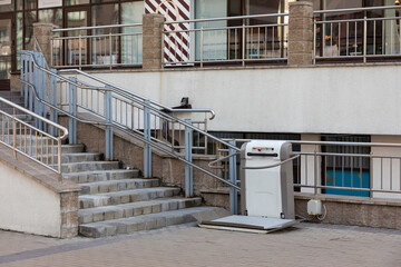 Fototapeta na wymiar Lifting ramp with a mechanism for people with disabilities