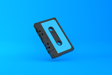 Vintage audio tape cassette on a blue background. Front view with copy space. 3d rendering illustration