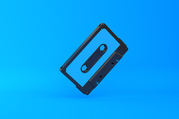 Vintage audio tape cassette on a blue background. Front view with copy space. 3d rendering illustration