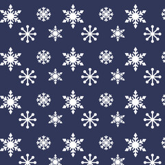 Seamless pattern with white snowflakes. Winter vector illustration. Blue background.