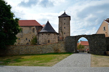 Fototapeta na wymiar The water castle of Švihov - arrival from the town (Europe – Czech Republic)