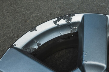 Corrosion on a silver aluminum alloy wheel close-up