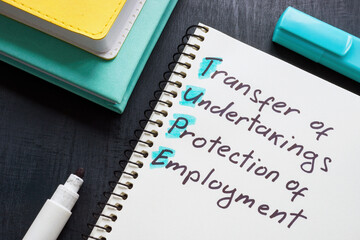 Page with words TUPE Transfer of Undertakings Protection of Employment Regulations.