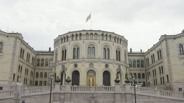 Buildings of the Parliament of Norway. Action.Old white stone building,Storting Monument