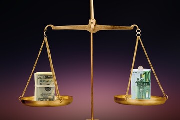 Concept of money on scales on color background