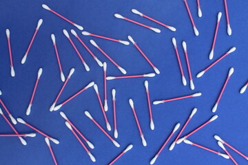 Abstract background of cotton buds on a blue background.