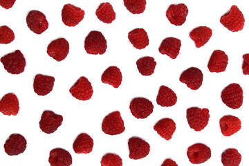 Background of ripe red raspberries on a white background.