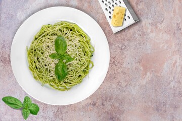 Pasta with basil pesto sauce. Tasty dish