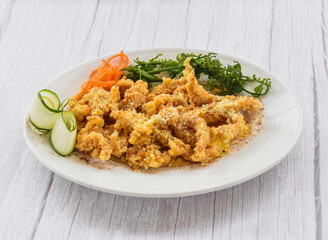 Chicken Finger Butter Garlic served in dish isolated on grey wooden background side view of fastfood